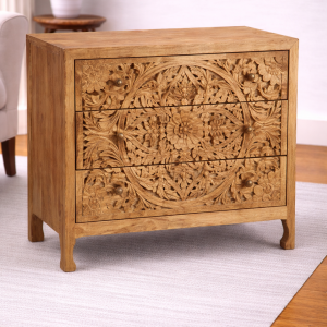 Hand carved wooden chest of drawers.